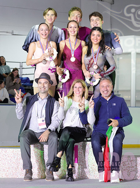 The Medalists with coaches